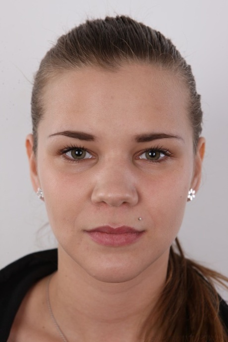 Nice teen Izabela gets completely naked before a close-up of her snatch