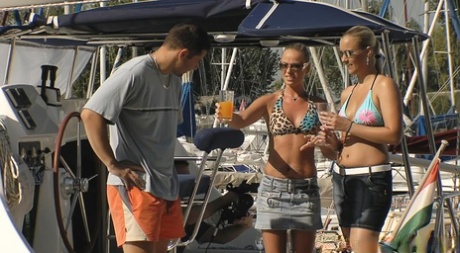 Blonde girls and their boyfriends have a foursome fuck while on a boat