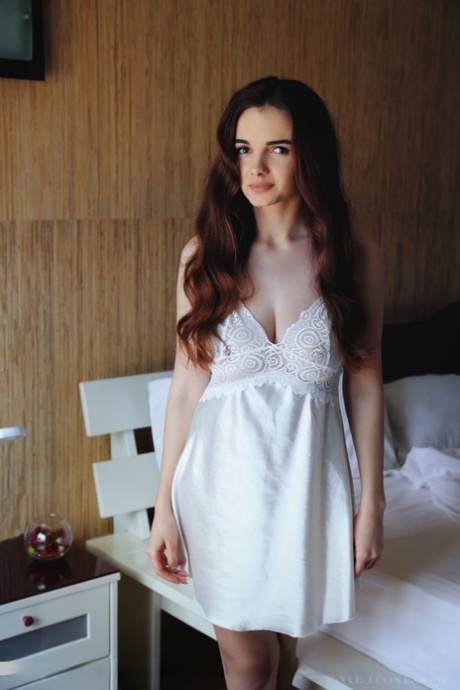 Busty teen Maible puts her tight slit on display during nude poses on bed