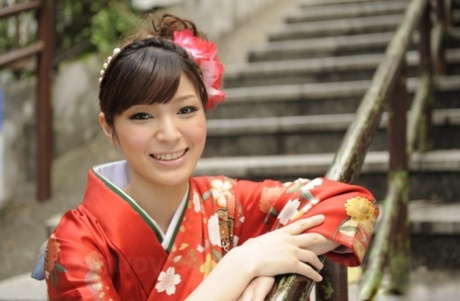 Pretty Japanese girl Yuria Tominaga shows her bush while wearing a kimono