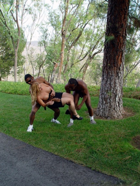 Blonde slut Holly gets fucked in all 3 holes by black men with big dicks
