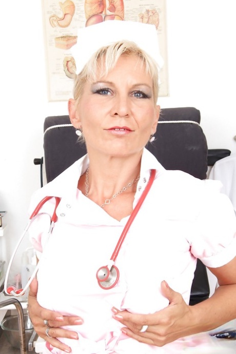 Filthy mature nurse in nylons stuffing her cunt with toys and med tools