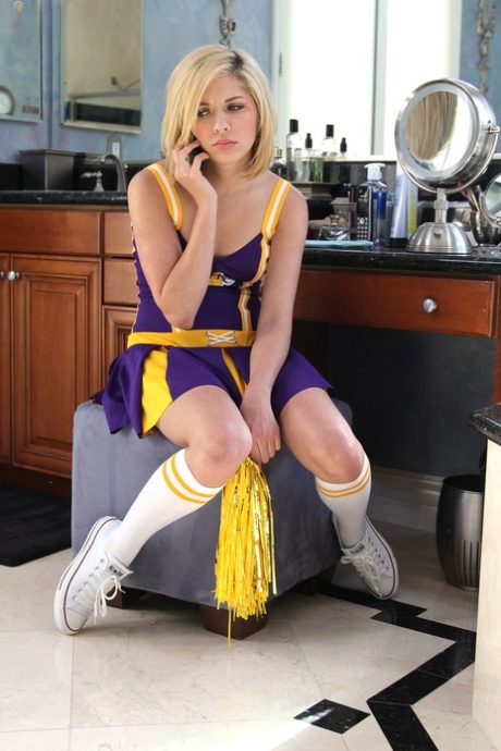 Petite cheerleader Lia Lor gets fucked under the shower by her lover