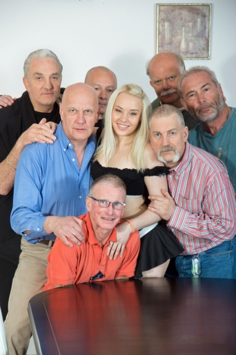 Sexy blonde teen Lolita Taylor fucked by a group of old farts in each hole