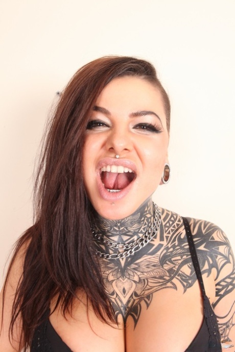 Canadian punk girl spreads her leg in black hooker socks and high heels