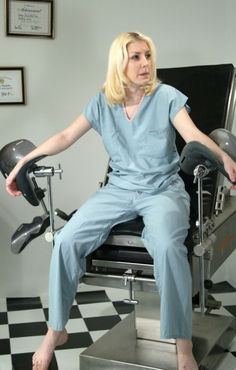 Sexy nurse TJ receives erotic electro-shock therapy on her pussy while bound