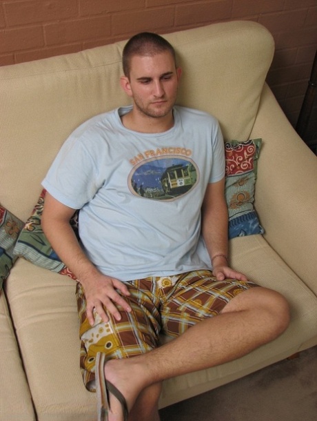 Shaven-headed gay hottie Zach Beef undresses and jerks off in a solo