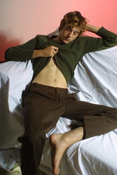 Hot twink strips completely naked & wanks while showing his big balls