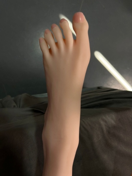 Little silicone sex doll Yuri reveals her big tits and fingers herself