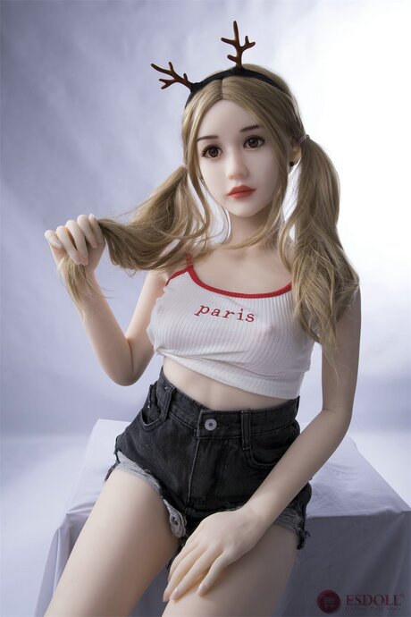 Sweet teen Asian sex doll Yue presents her big juggs and warm cunt in a solo