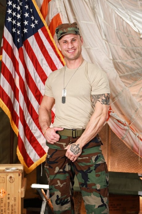 Muscular American military men Andrew Miller and Blain OConnor have gay sex