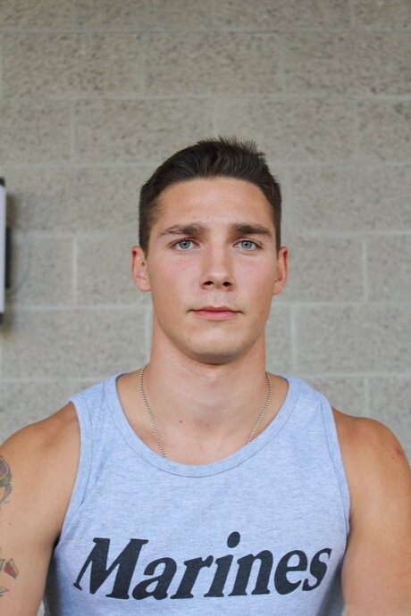 Muscular white man Spencer Laval unveils his long cock while getting naked