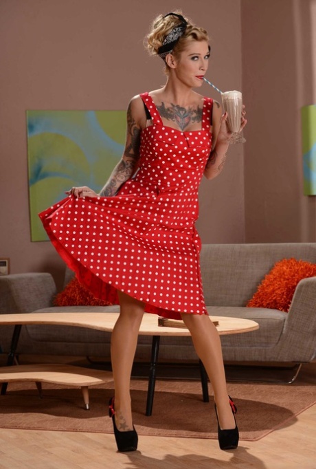Hot pin-up model Kleio Valentien strips to her lingerie & makes a phone call